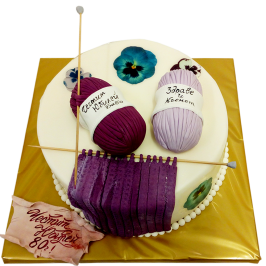 Anniversary cake "Knitting" F542 with two 3D balls of sugar dough yarn, purple knitting and decorative knitting needles