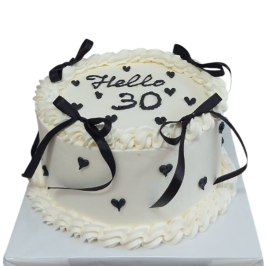 Anniversary cake "Hello 30" in white with black ribbons and hearts – F1816