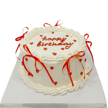 White birthday cake with red ribbons and the inscription "Happy Birthday" - Ф1815
