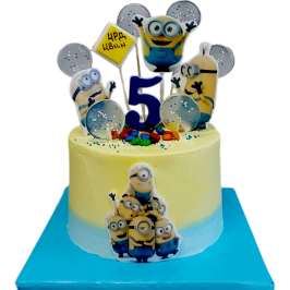 Children's cake Minions F1933 with minion figurines, number 5 and yellow-blue decoration.