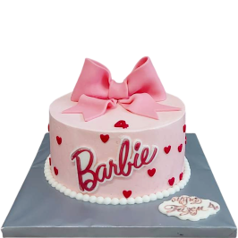 Pink Barbie children's cake with large 3D fondant ribbon and hearts, model F2007 by Sladkarnitsa Roza