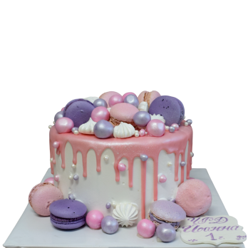 Pink and white drip cake with macarons, meringues and pearl sugar balls, model F995 from Sladkarnitsa Roza 🎂