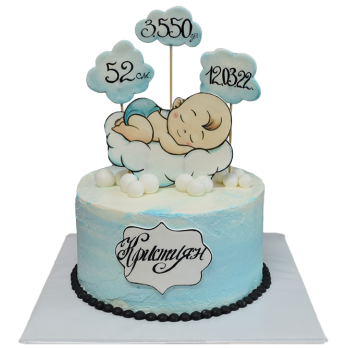 Blue baby cake with a figure of a sleeping baby on a cloud and clouds with the birth details